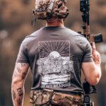 tshirt featuring design of a heavy weapons platoon with two vehicles and a mounted .50 caliber gun