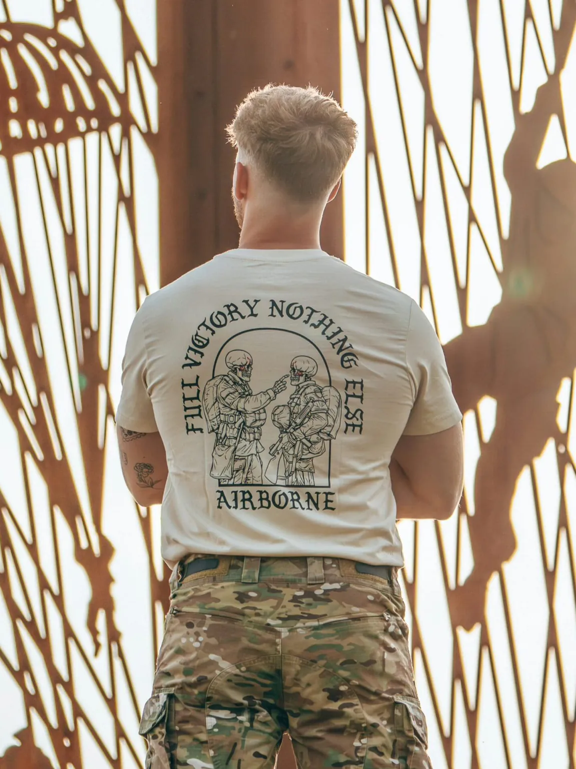 20240903_160744-scaled-1.jpg tshirtfeaturing World War II design of two soldiers standing before a parachute jump