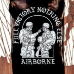 flag featuring World War II design of two soldiers standing before a parachute jump