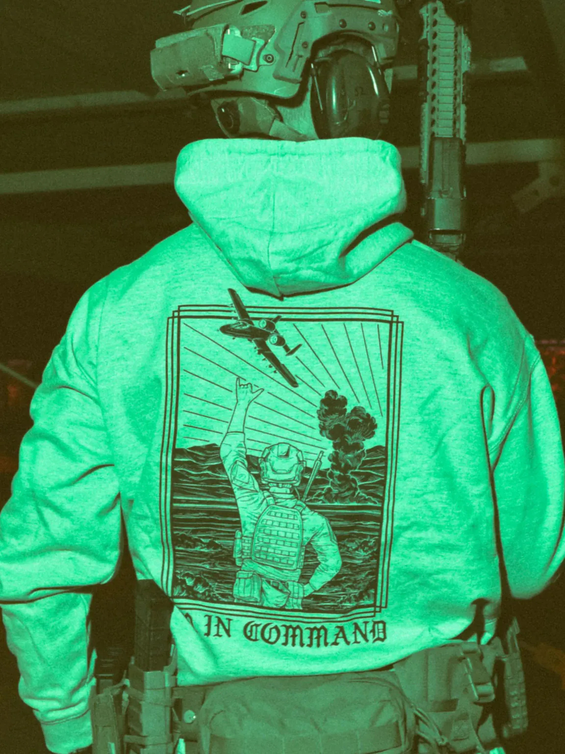 Im-in-command-heather-grey-hoodie-edit the trace apparel collection featuring a fst jtac guy standing in front of a firing plane
