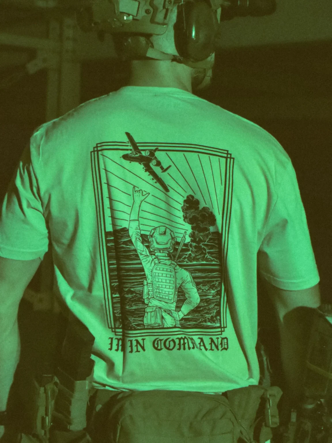 Im-in-command-sand-shirt-edit the trace apparel collection featuring a fst jtac guy standing in front of a firing plane