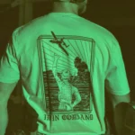 the trace apparel collection featuring a fst jtac guy standing in front of a firing plane