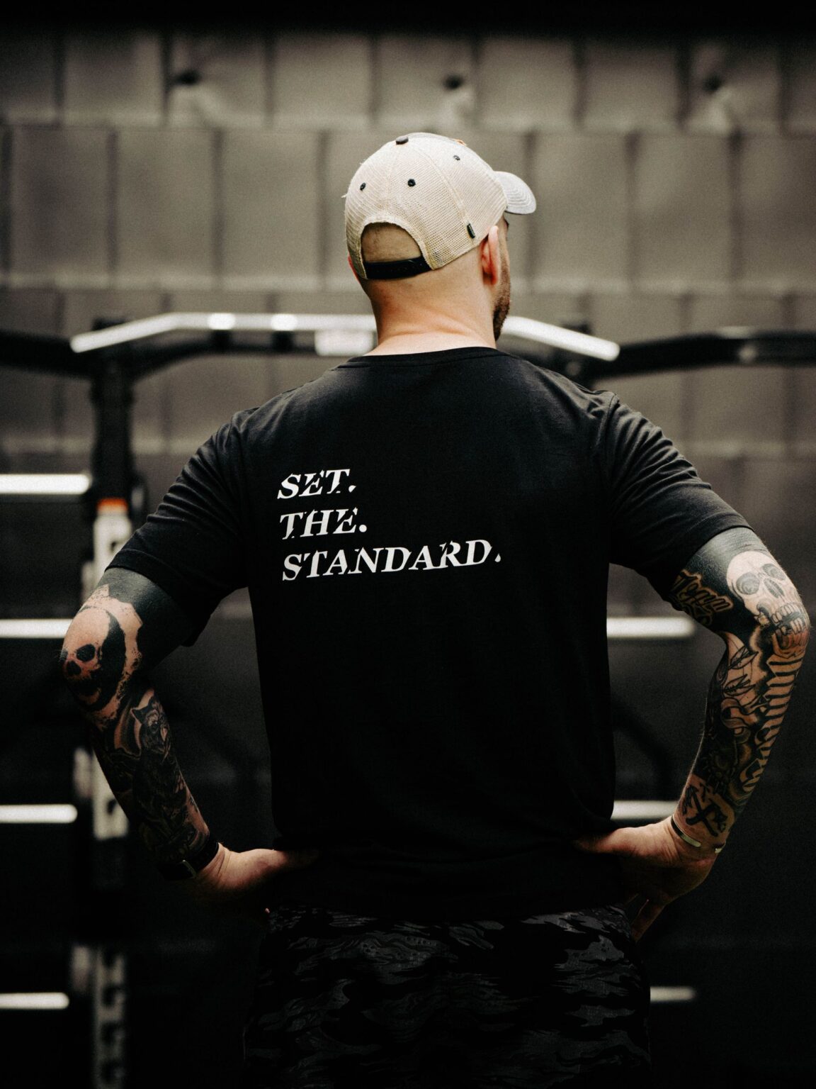 Black T-shirt from The Trace featuring Set the Standard design symbolizing the pursuit of the highest performance