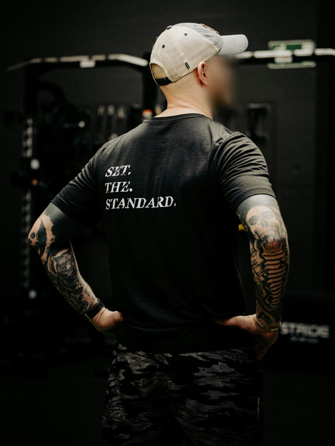 Point Blur_May222025_144216 verkleind Black T-shirt from The Trace featuring Set the Standard design symbolizing the pursuit of the highest performance