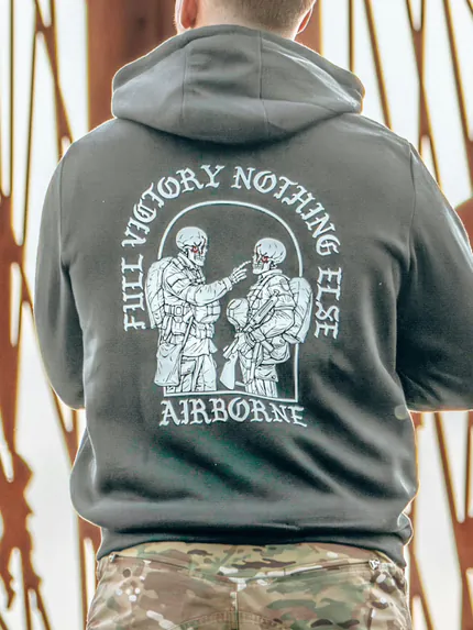 Hoodie featuring World War II design of two soldiers standing before a parachute jump