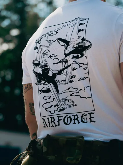 Lightweight t-shirt featuring an F-16 and F-35 in flight, paying tribute to speed, precision, and power