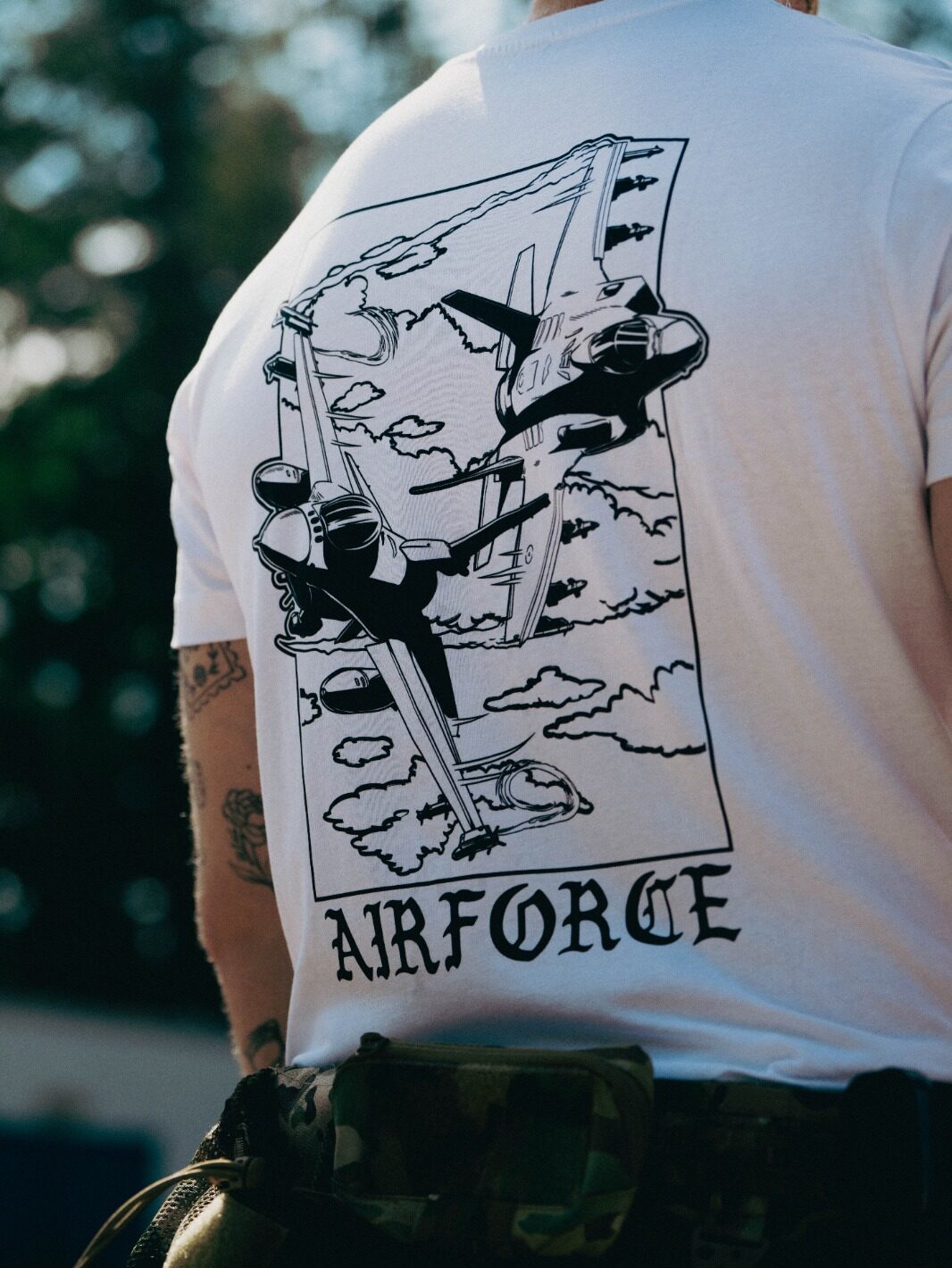 Lightweight t-shirt featuring an F-16 and F-35 in flight, paying tribute to speed, precision, and power