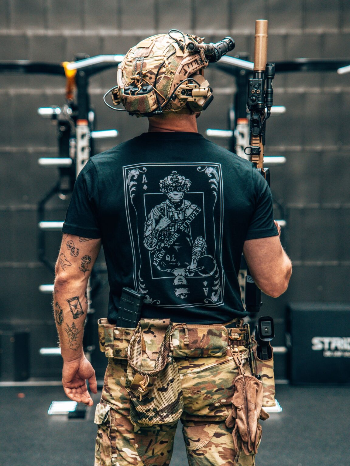 Dts black tee 1 Earn Your Stripes T-Shirt, military apparel by The Trace