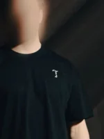 Black T-shirt from The Trace Premium collection with clean, minimalist design