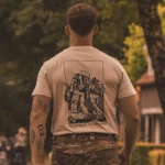 sand T-shirt from The Trace featuring design of two soldiers marching in the Nijmegen Four Days Marches