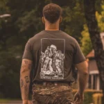 olive T-shirt from The Trace featuring design of two soldiers marching in the Nijmegen Four Days Marches