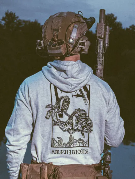 the trace apparel collection featuring two military reconnaissance divers swimming underwater