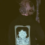 the trace apparel collection with 2 guys sitting in front of a explosing because they are part of the eod