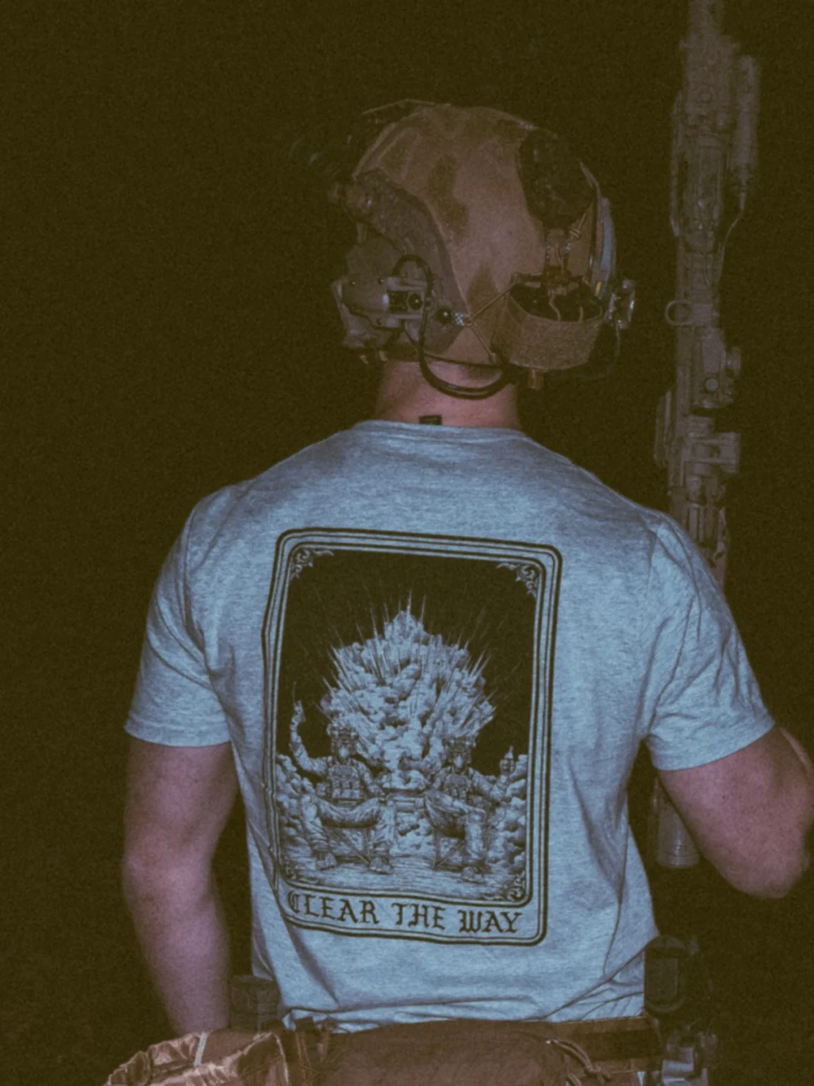 Clear-the-way-heather-grey-shirt the trace apparel collection with 2 guys sitting in front of a explosing because they are part of the eod