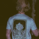 the trace apparel collection with 2 guys sitting in front of a explosing because they are part of the eod