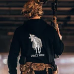 the trace apparel collection featuring a holy cow armed with weapons