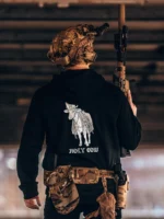 the trace apparel collection featuring a holy cow armed with weapons