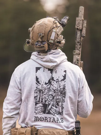 the trace apparel collection featuring guys firing a 81mm mortar and a 120mm mortar