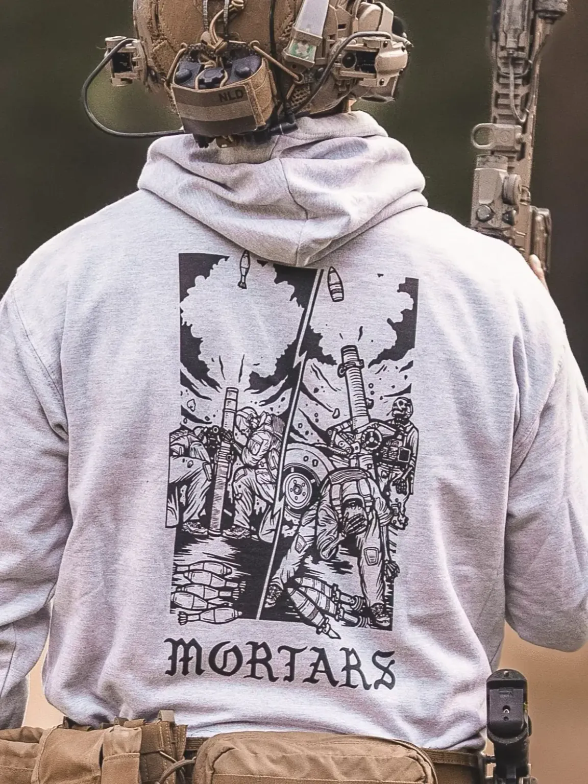 the trace apparel collection featuring guys firing a 81mm mortar and a 120mm mortar