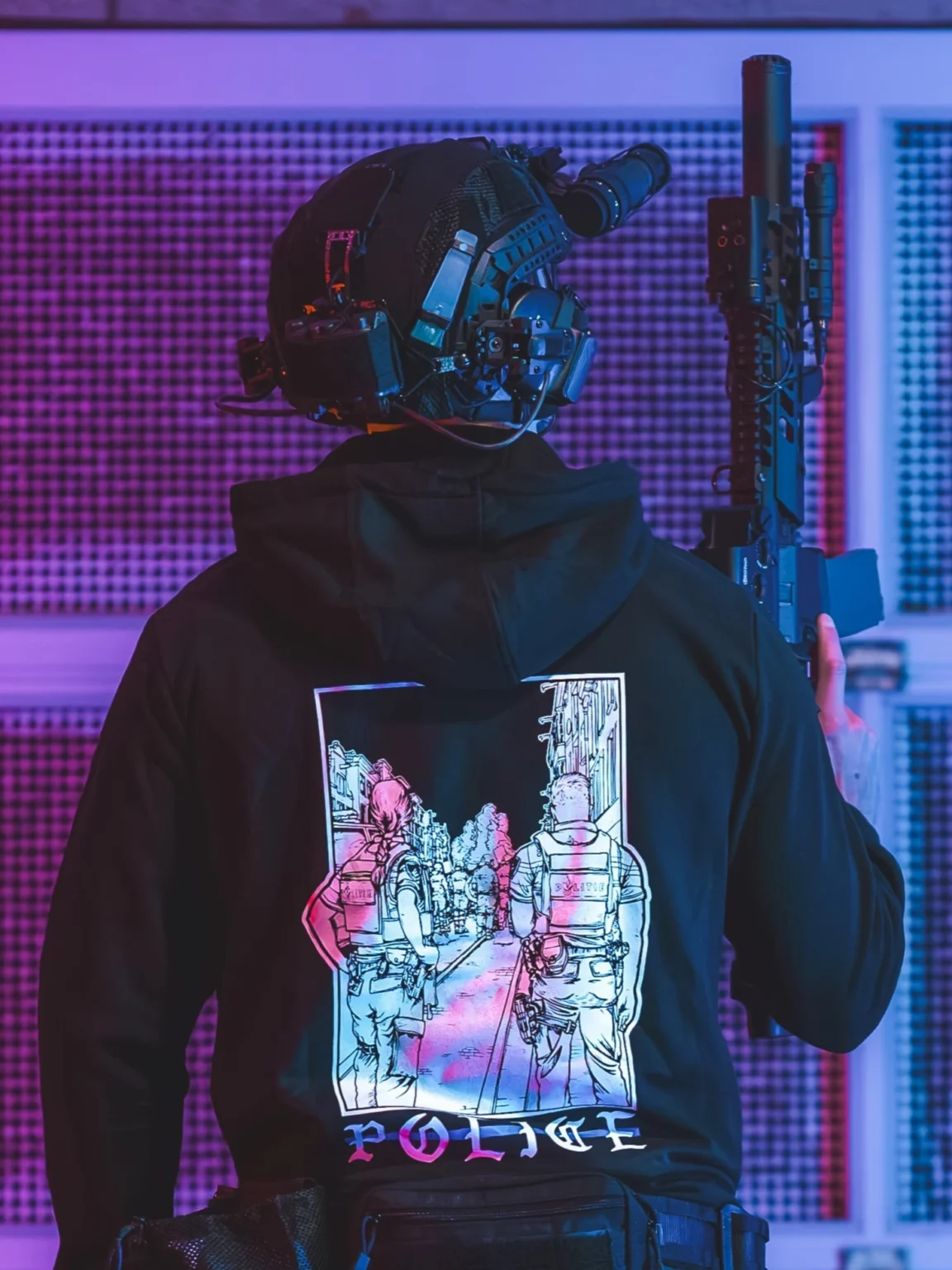 Police-hoodie-black the trace apparel collection featuring two police cops standing in a street watching a riot