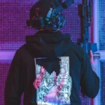 the trace apparel collection featuring two police cops standing in a street watching a riot
