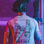 the trace apparel collection featuring two police cops standing in a street watching a riot