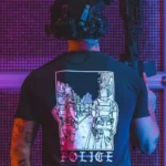 the trace apparel collection featuring two police cops standing in a street watching a riot