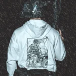 the trace apparel collection featuring a design with a military operator standing next to a snowman with a text saying anti snow flake club