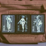 the trace apparel collection patch featuring 3 woman holding a sniper machine gun and anti tank weapon