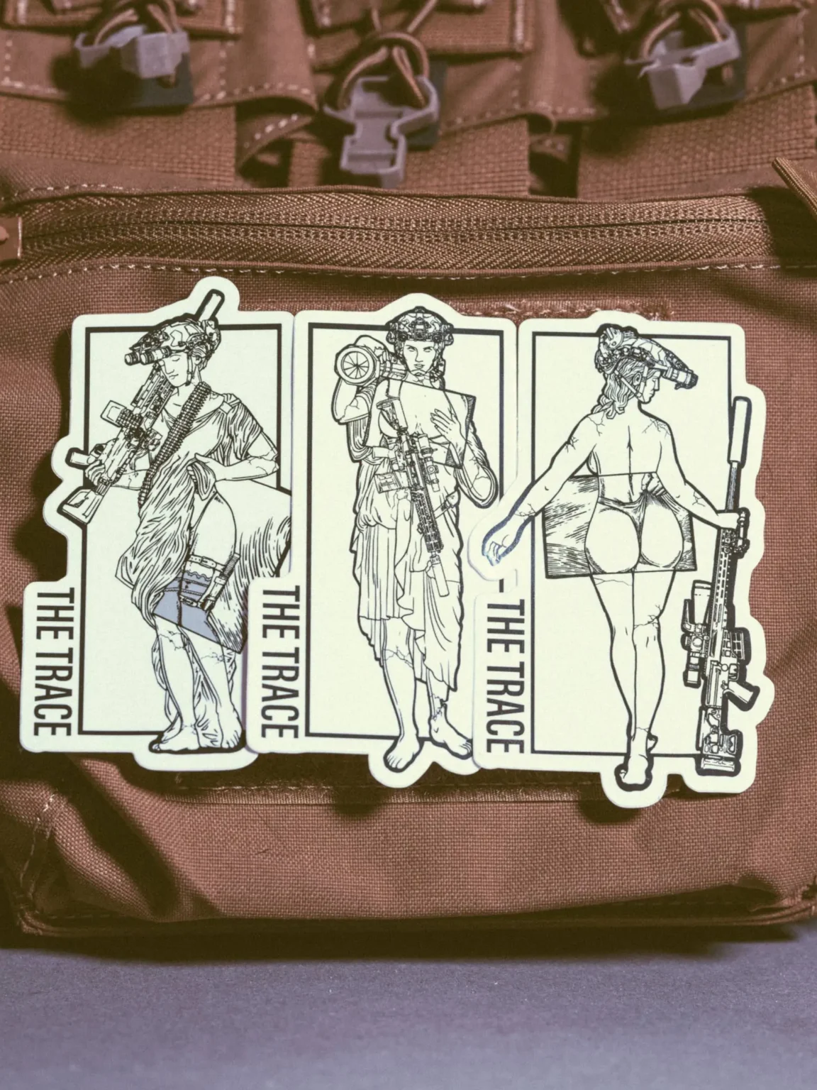 Statue-stickers-edit_1 the trace apparel collection stickers featuring a woman holding a anti tank weapon machine gun and sniper
