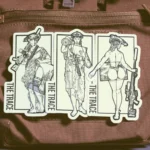 the trace apparel collection stickers featuring a woman holding a anti tank weapon machine gun and sniper