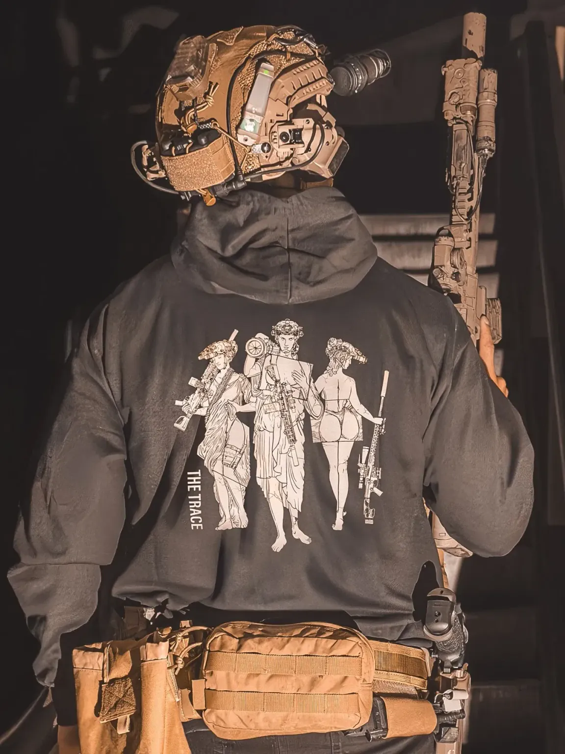 Statues-limited-hoodie black hoodie from The Trace featuring 3 girls carrying a machinegun sniperrifle and anti tank weapon