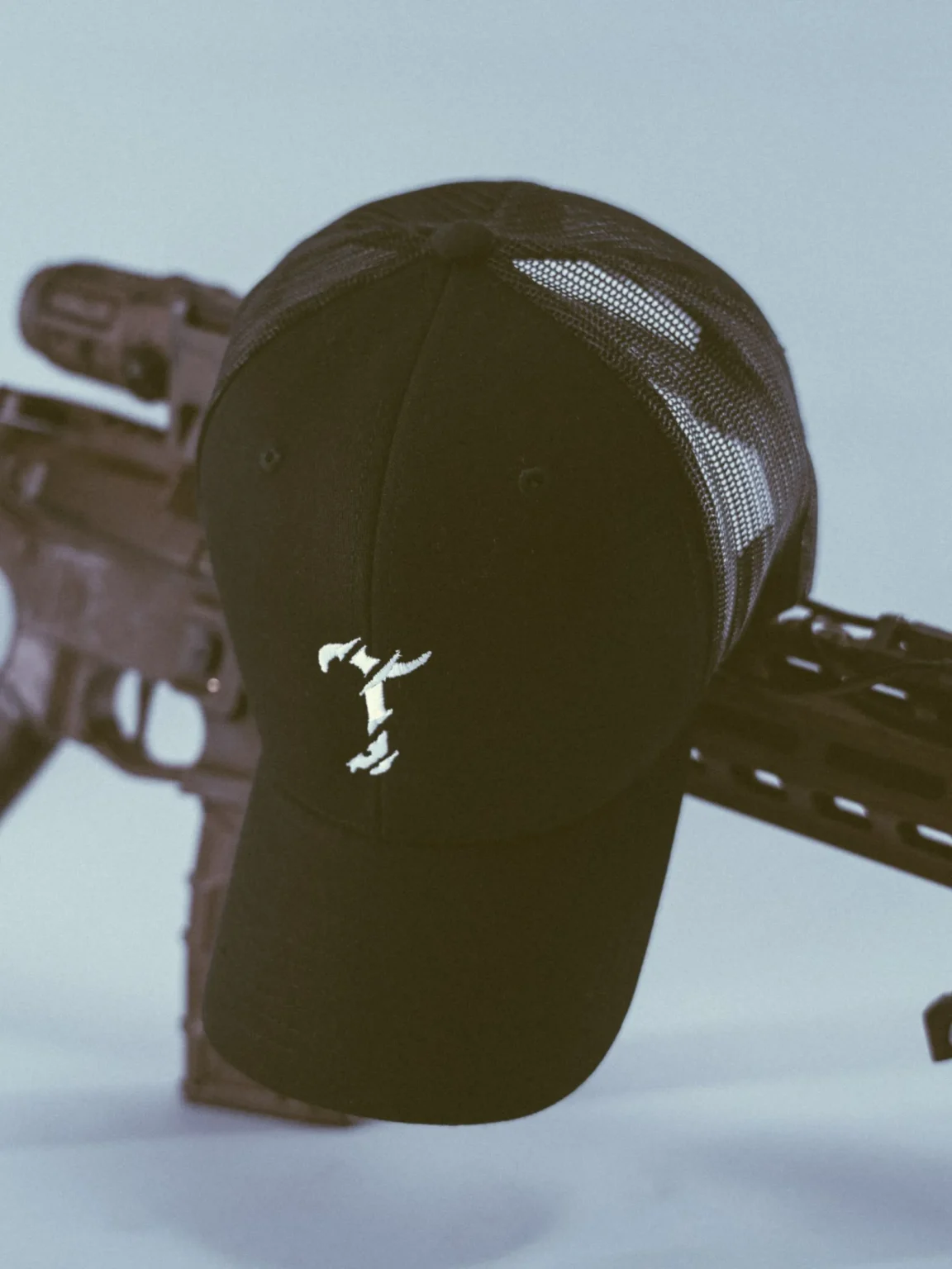 trucker-cap-black The Trace military trucker cap with embroidered logo and mesh back