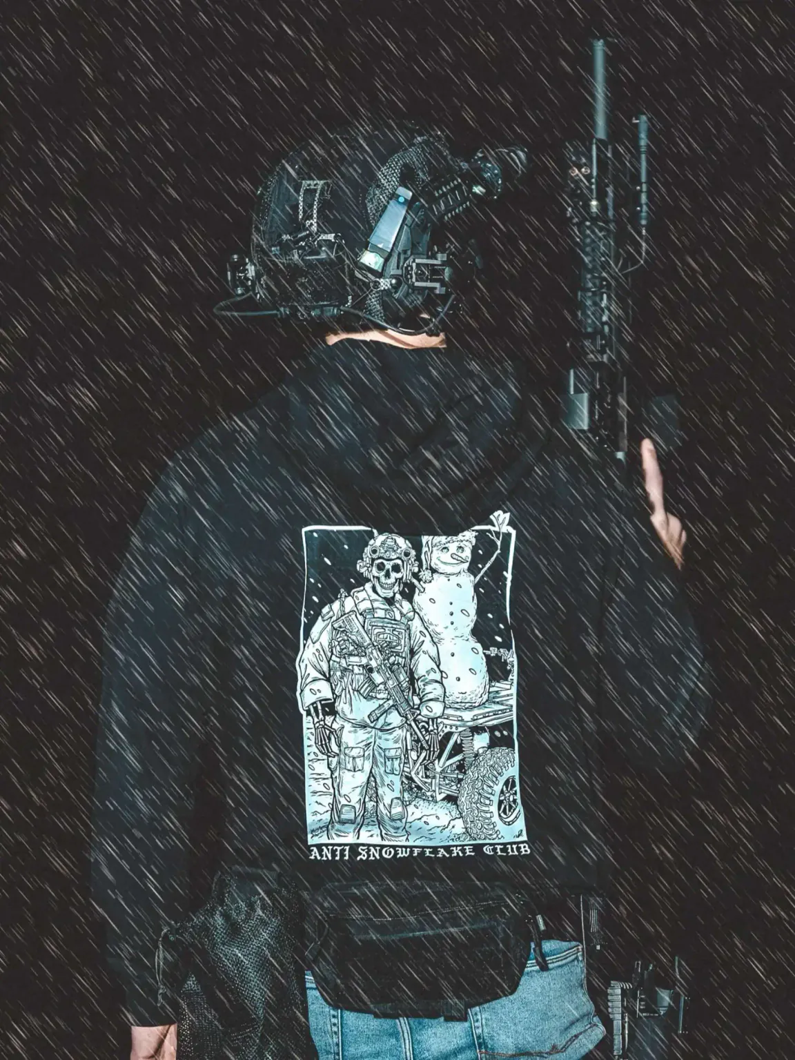 anti-Snowflake-design-black-hoodie_2 the trace apparel collection featuring a design with a military operator standing next to a snowman with a text saying anti snow flake club