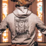 the trace apparel collection featuring skeletons praying to an hourglass showing atomic weapons dropping