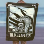 the trace apparel collection featuring marines standing partly in the water