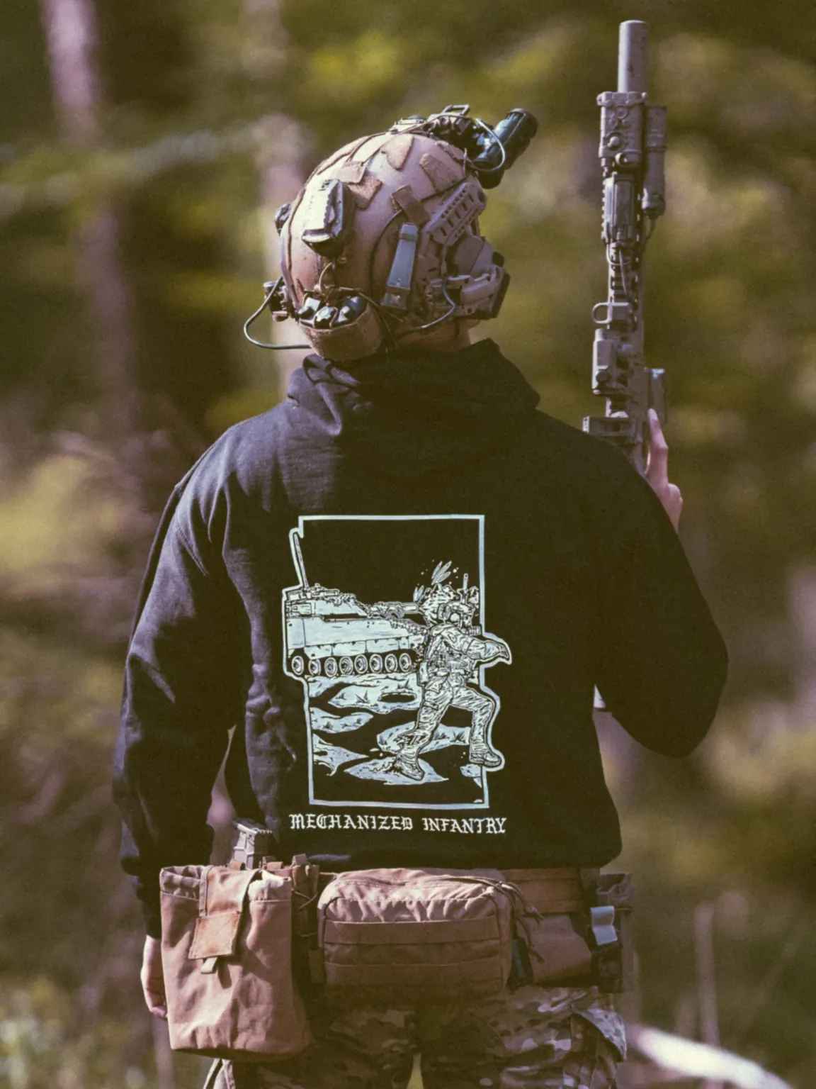 mechanized-infantry-hoodie-black the trace apparel collection featuring guys fighting alongside a military cv90 vehicle