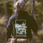 the trace apparel collection featuring guys fighting alongside a military cv90 vehicle