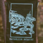 the trace apparel collection featuring guys fighting alongside a military boxer vehicle