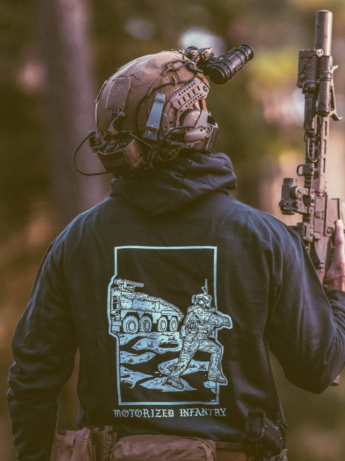 motorized-infantry-hoodie-black the trace apparel collection featuring guys fighting alongside a military boxer vehicle