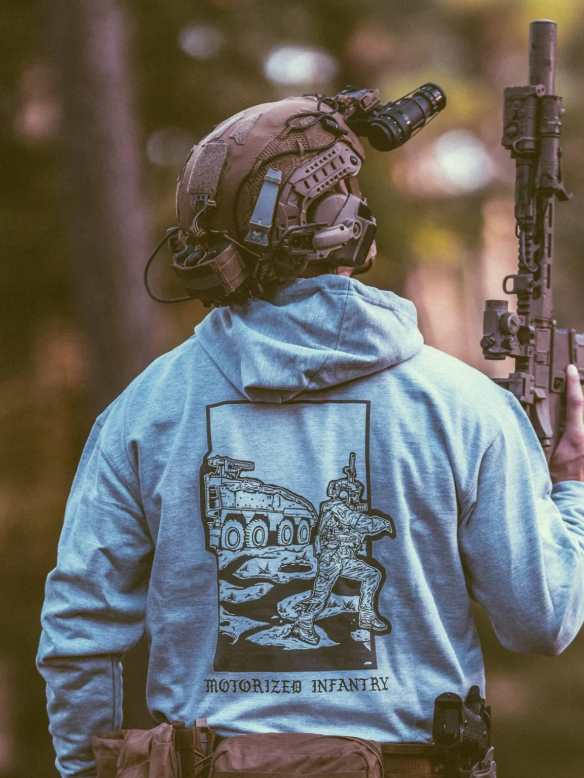 motorized-infantry-hoodie-heather-grey the trace apparel collection featuring guys fighting alongside a military boxer vehicle