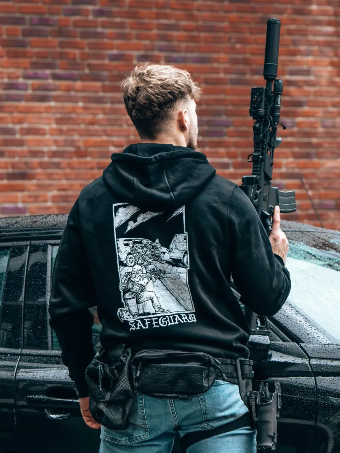 safeguard-black-hoodie_1 the trace apparel collection featuring a group of operators protecting a vip