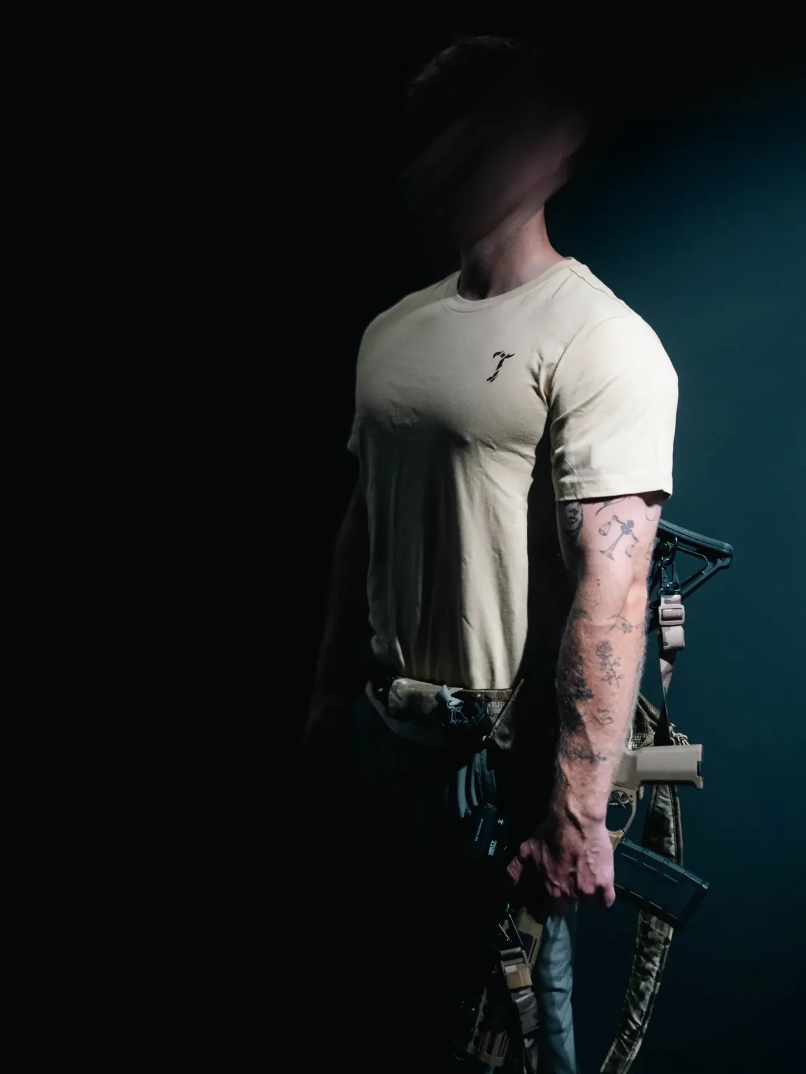 Sand T-shirt by The Trace on a model, seen from the front side with the small T logo on the chest