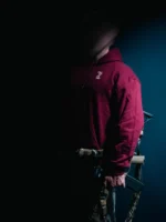 the trace mockup clothing featuring their T logo on the chest and a weapon on the hand