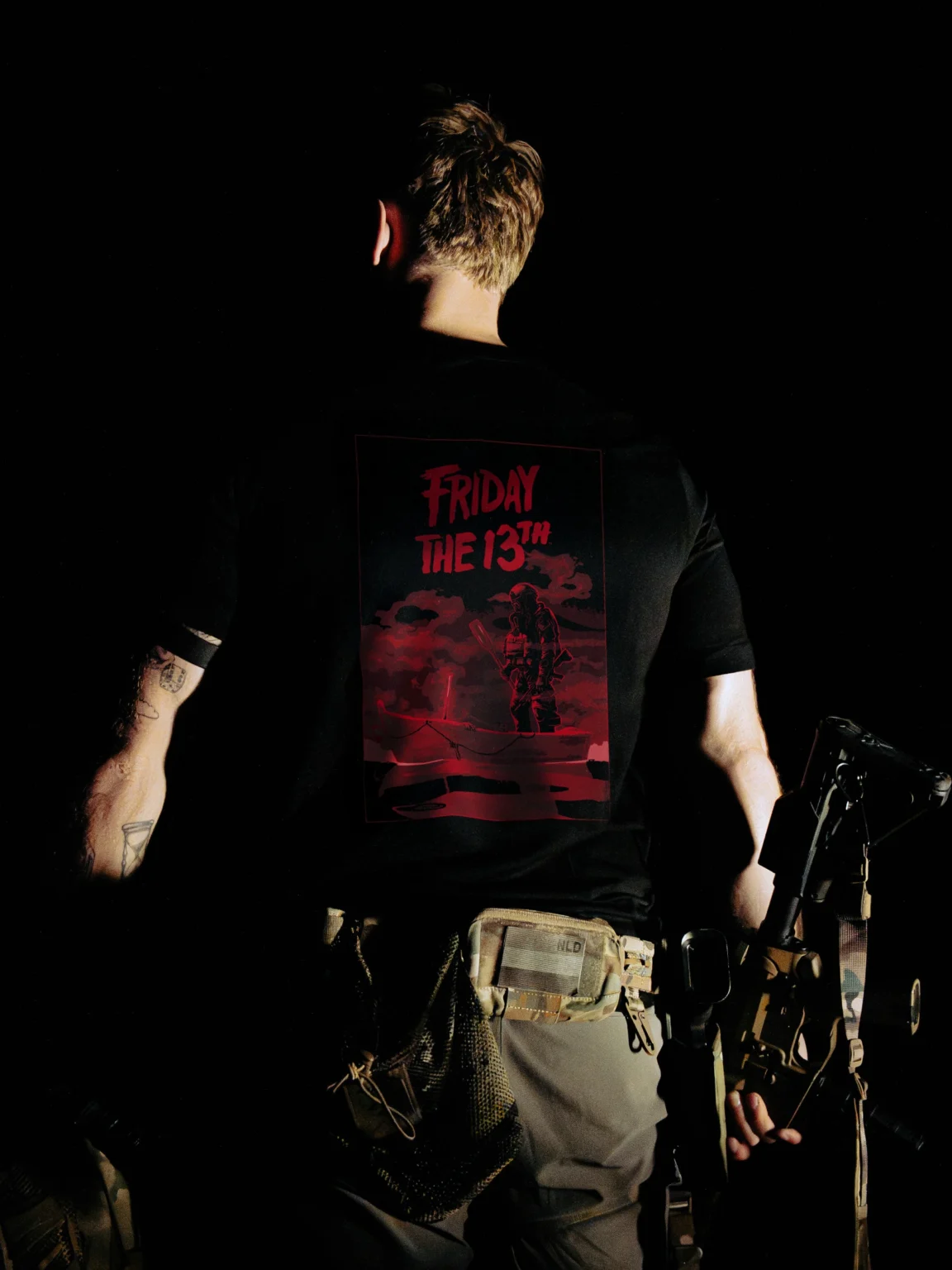 DSC01754 Halloween Friday the 13th T-shirt in black by The Trace, back print with a red horror poster of a masked soldier