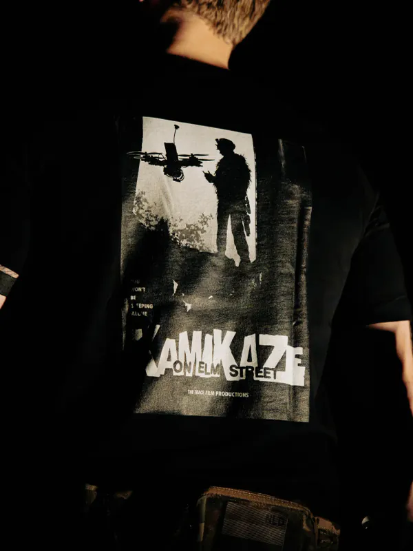 Close-up of the Kamikaze on Elm Street back print on the black The Trace T-shirt