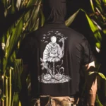 the trace halloween shirt with a scarecrow