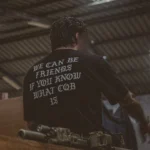 the trace oversized shirt with a text saying we can be friends if you know what cqb is