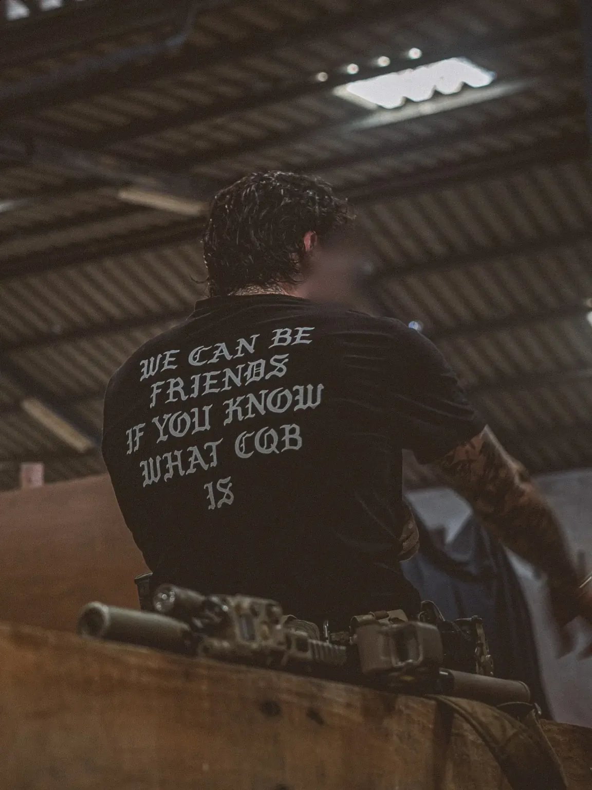 Point-Blur_Oct072025_155302 the trace shirt with a text saying we can be friends if you know what cqb is