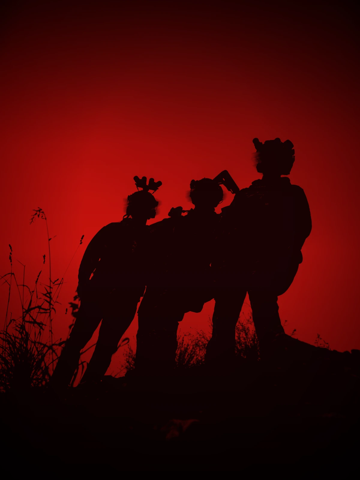 Three The Trace operators in silhouette against a red and black sky